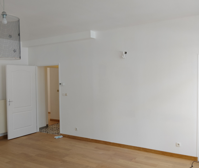 Pièce rénovée à Tourcoing : murs enduits et peints par Lima Plâtrerie